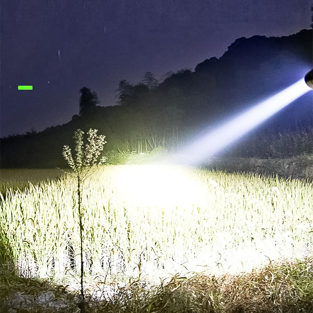 Compact USB rechargeable torch light, ideal for outdoor adventures and camping.