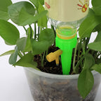 Side profile of green Plant Watering Spike irrigation tool