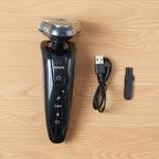 Close-up of rotary shaver trimming beard