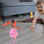 Flying Bird RC Toy in mid-flight with LED lights