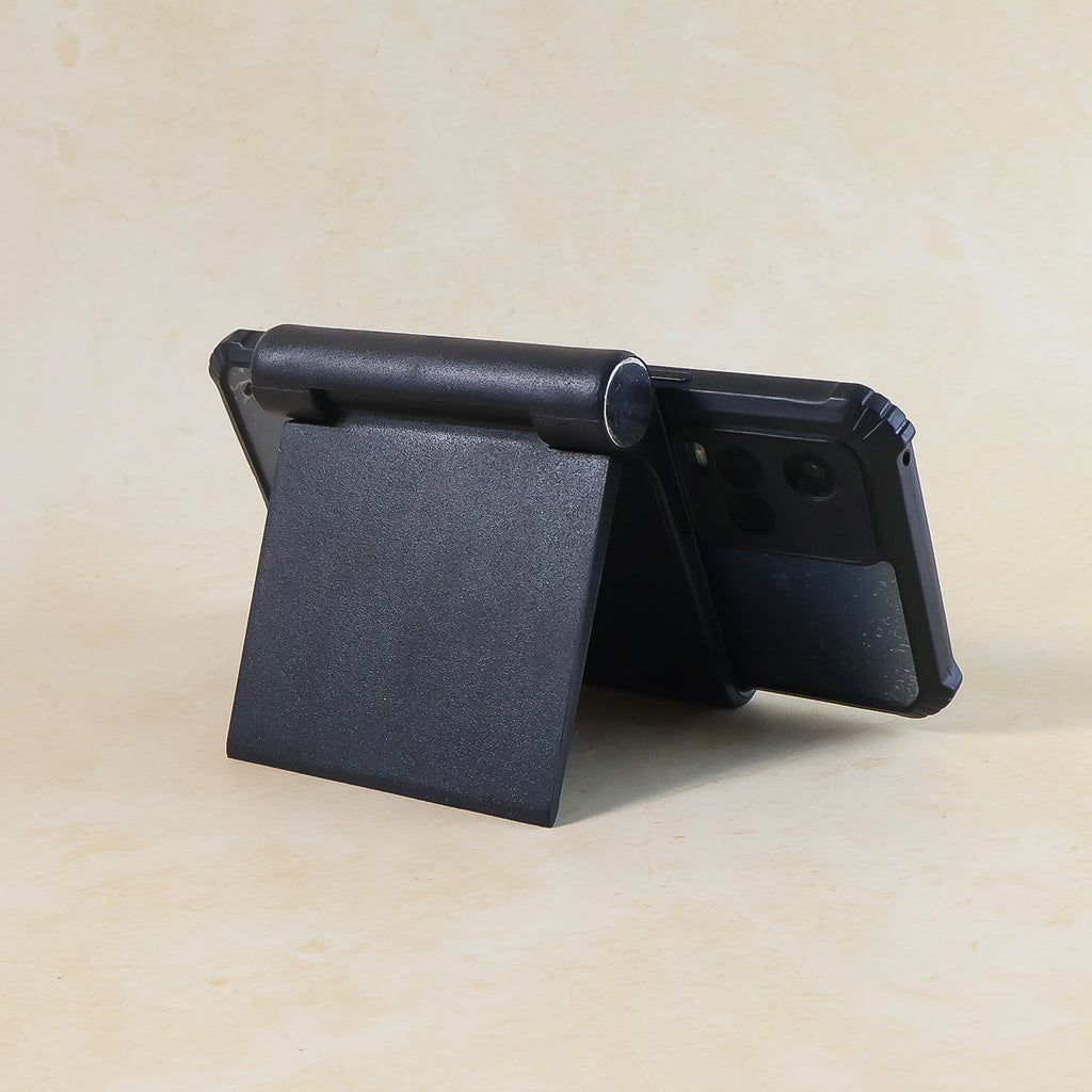 Side view of sleek black plastic foldable desktop mobile stand