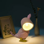 Kids playing near the portable Magnetic Parrot Night Lamp.