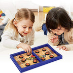 Kids enjoying a fast-paced desktop basketball game on a wooden table.