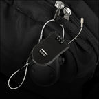 A black retractable cable lock with its wire extended, showcasing the 3-digit combination dials.