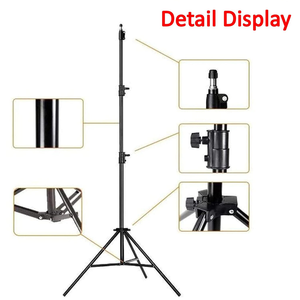 Artist setting up an adjustable metal easel for painting outdoors.