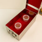 Full front view of the stainless steel Jewellery Storage Box with its luxurious red velvet interior.