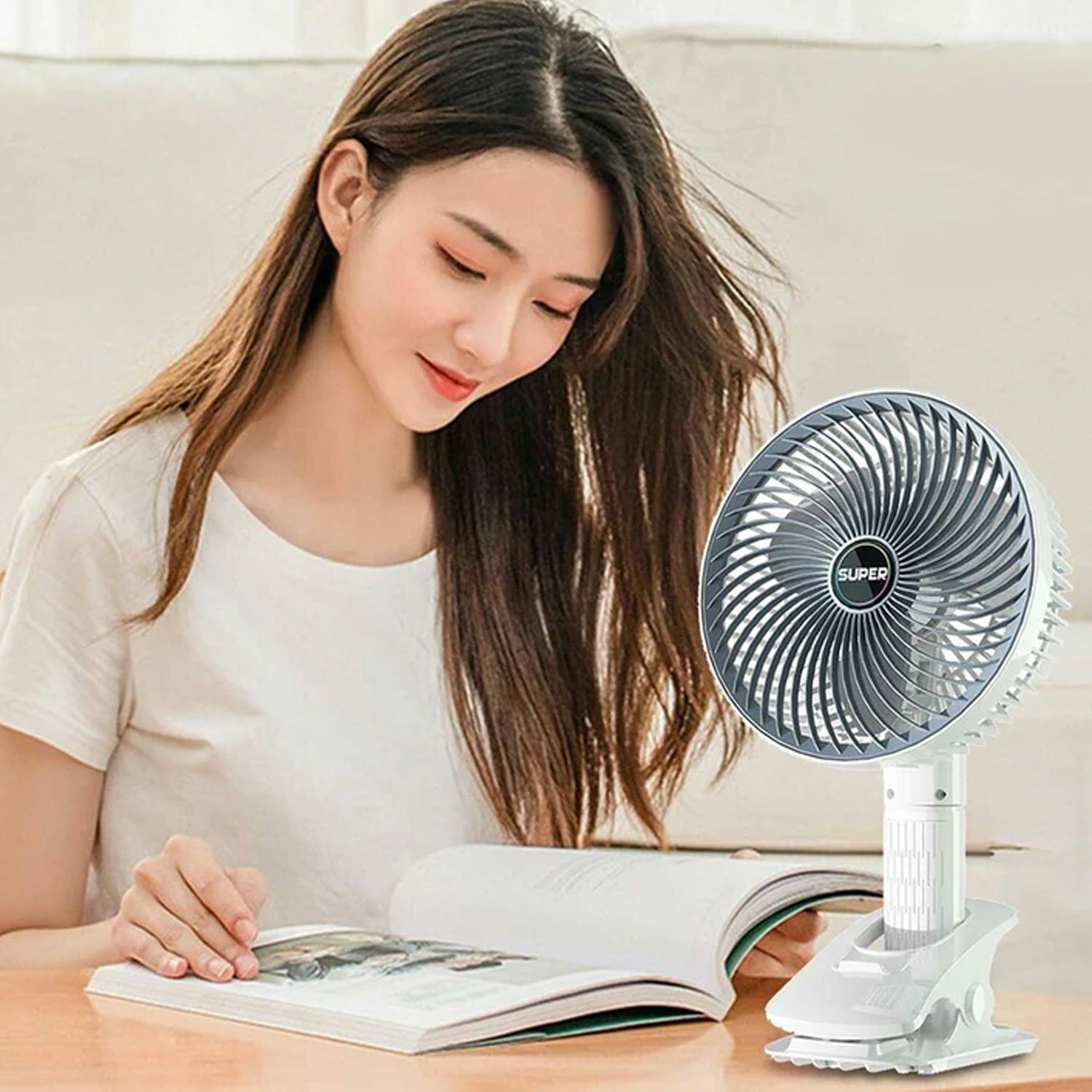 Portable handheld USB fan showing compact size and ergonomic design