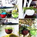 Three plastic hanging flower pots with chains, arranged aesthetically to show their decorative appeal.