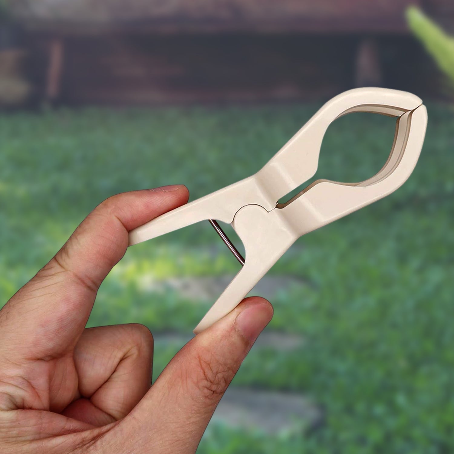 Clips firmly holding clothes on drying rope in windy outdoor conditions