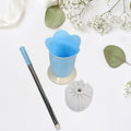 Premium toilet brush with holder stand in a modern bathroom.