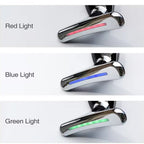 Close-up of the Neck Face Massager head with indicator lights for different modes.