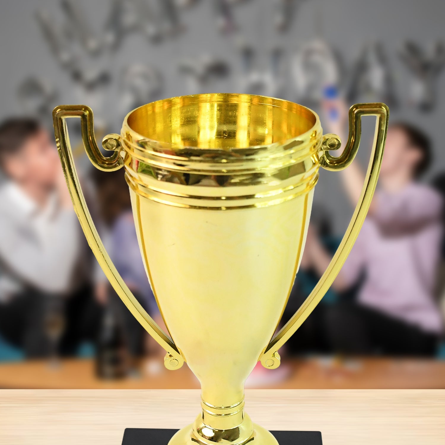 Top Cake Birthday Champion golden plastic trophy for celebrations