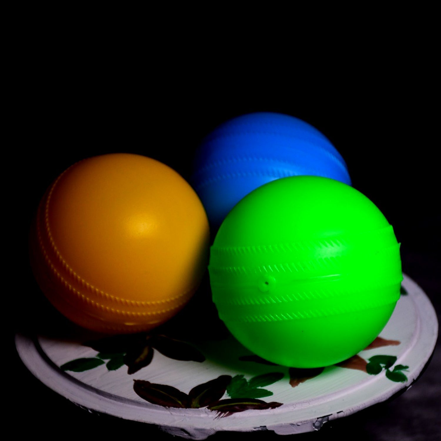 Soft and colourful Baby Play Balls filling a toddler's play tent.
