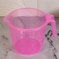 Transparent 1200ml bath water mug from Bathora, ready for use in a clean bathroom.