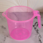 Transparent 1200ml bath water mug from Bathora, ready for use in a clean bathroom.