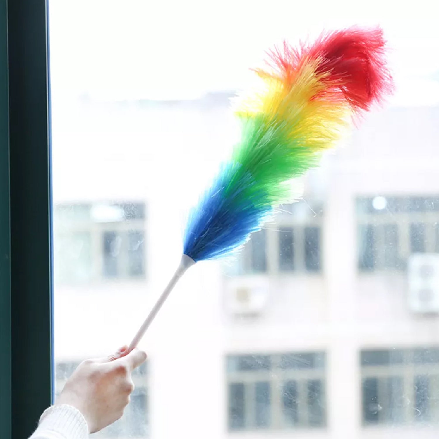 Ergonomic handle of a colourful microfiber cleaning duster.