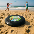 Small outdoor flying disc frisbee toy showing aerodynamic design for smooth flight