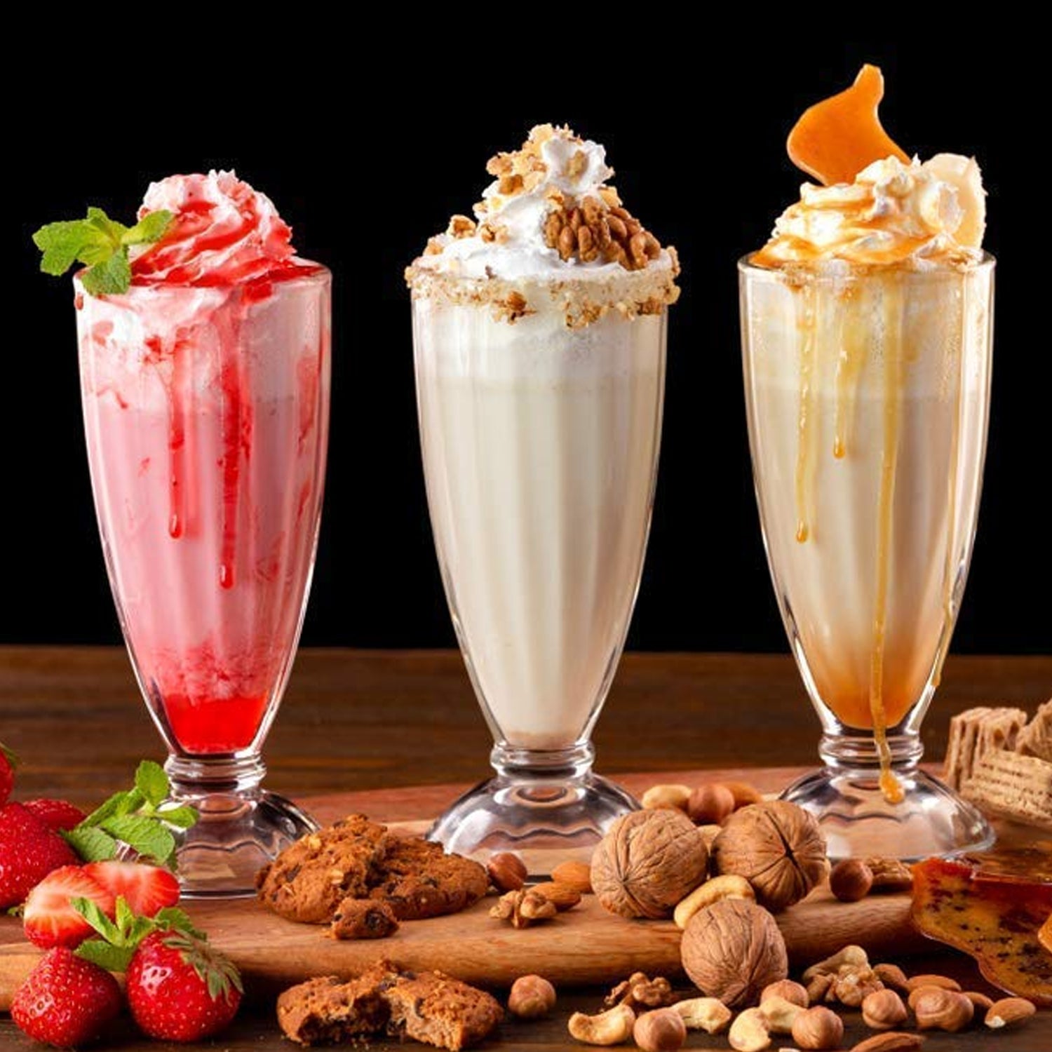 Collection of tall dessert and milkshake glasses with sturdy base