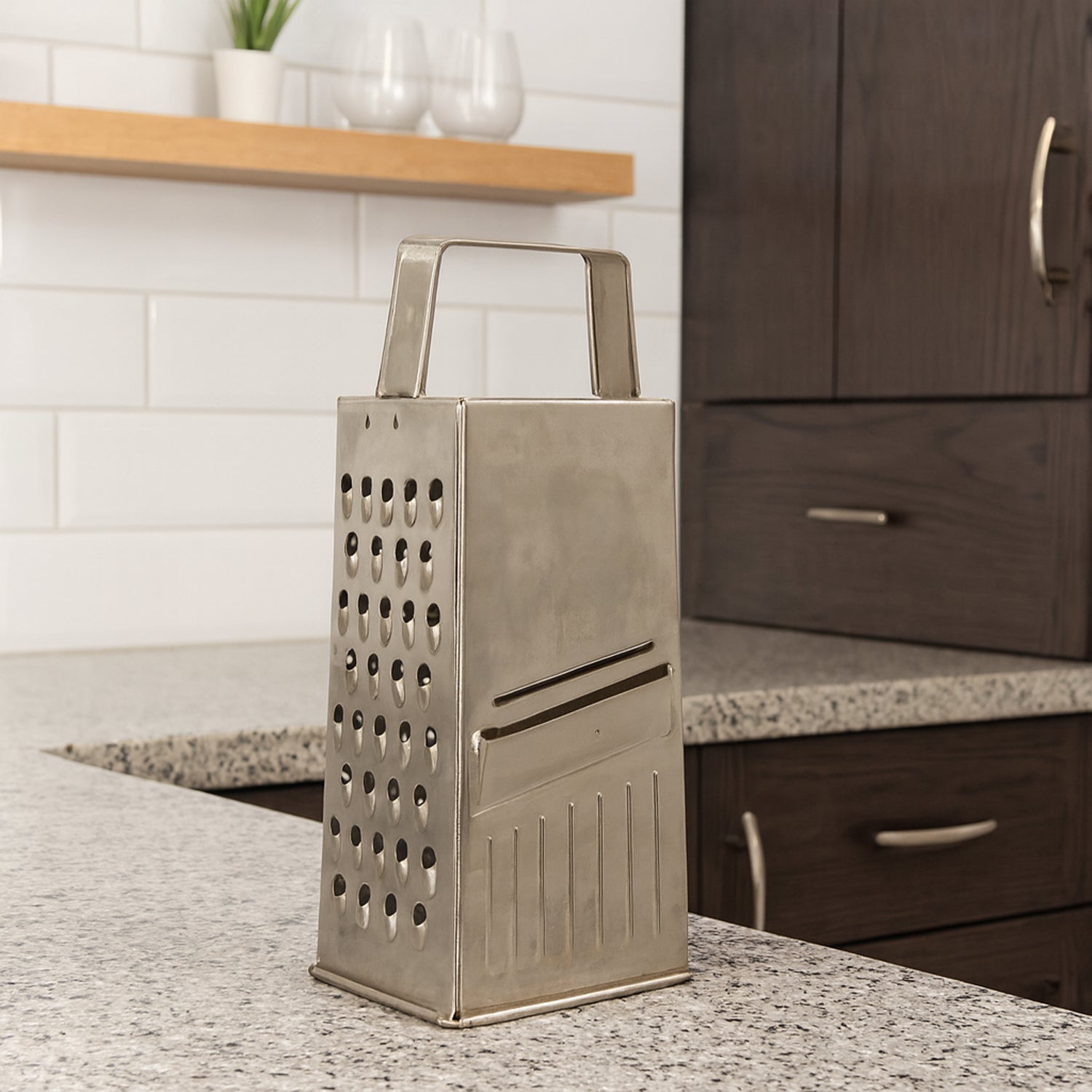 Efficient kitchen tool showing various slicing and grating surfaces.