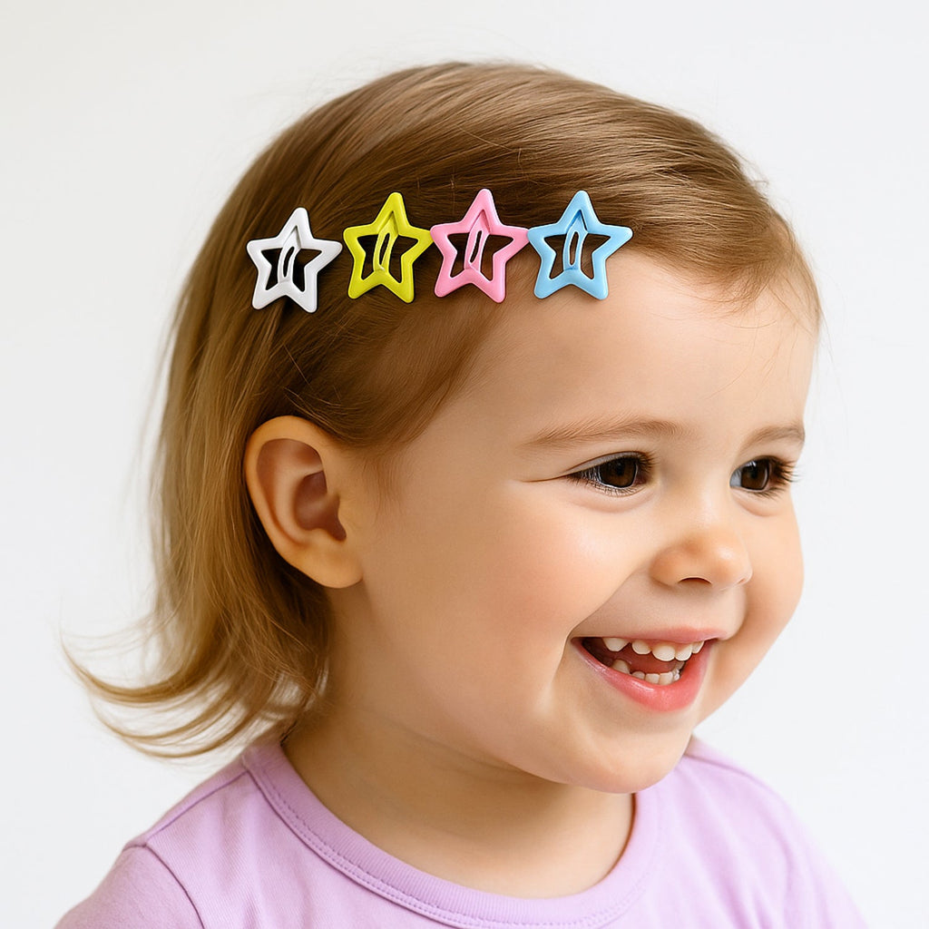 Star shape metal hair clip resting on wooden surface