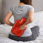 Rubber hot water bottle designed for back pain relief and period cramps