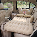 Inflatable car mattress installed in sedan back seat for travel