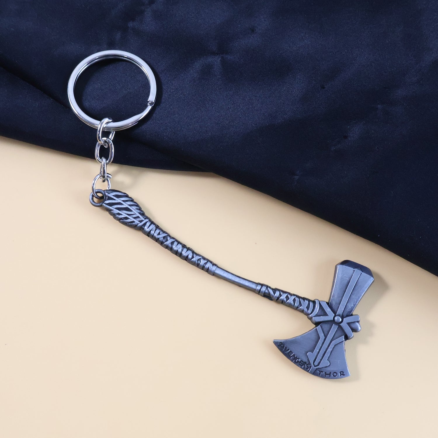 Compact and portable miniature metal axe keychain with detailed design