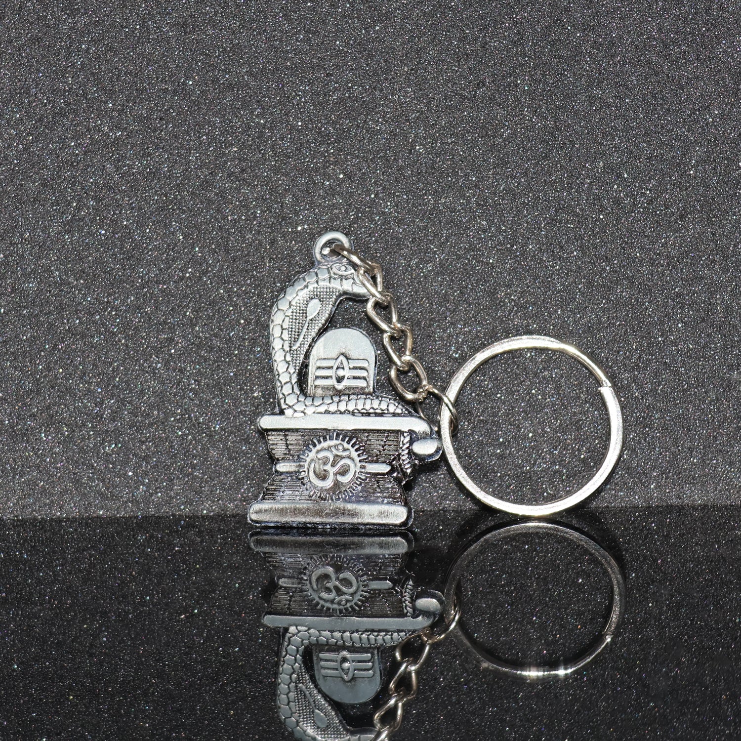 Elegant Shivling keychain with snake design in silver metal