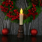 Close-up of premium decorative LED candle flame and classic holder
