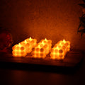 Set of 9 LED bubble flameless candles in modern decorative cube design