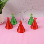 Set of mini LED Christmas tree lights glowing red, green, and white indoors
