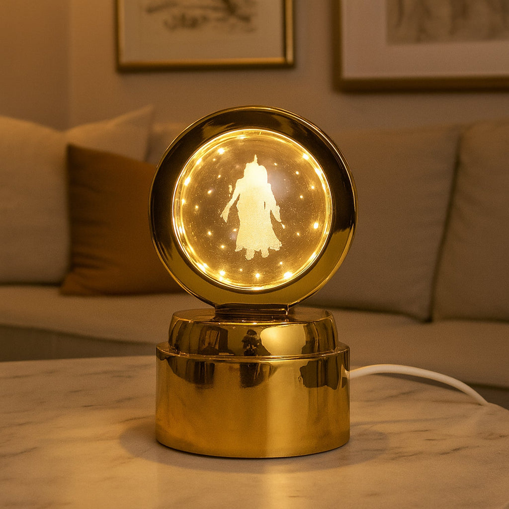 Rotating crystal ball night light with Radhe Krishna figure and golden decorated base