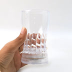 Group of friends enjoying drinks served in glowing LED Light Glass party cups.