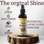 Natural wood polish spray restoring luster and shine on a wooden table surface.