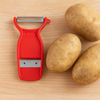 Compact 2-in-1 slicer and peeler with ergonomic handle for easy use