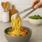 Sleek design of stainless steel serving tong for pasta and salad