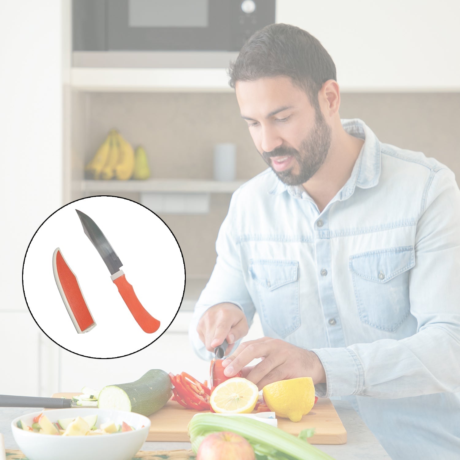Close-up of a sharp ceramic kitchen knife blade with its safety cover removed.