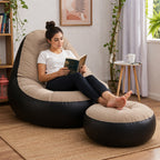 Close-up of inflatable sofa chair and footrest with electric pump