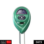 Close-up of green plant moisture sensor displaying pH, light, and moisture levels.
