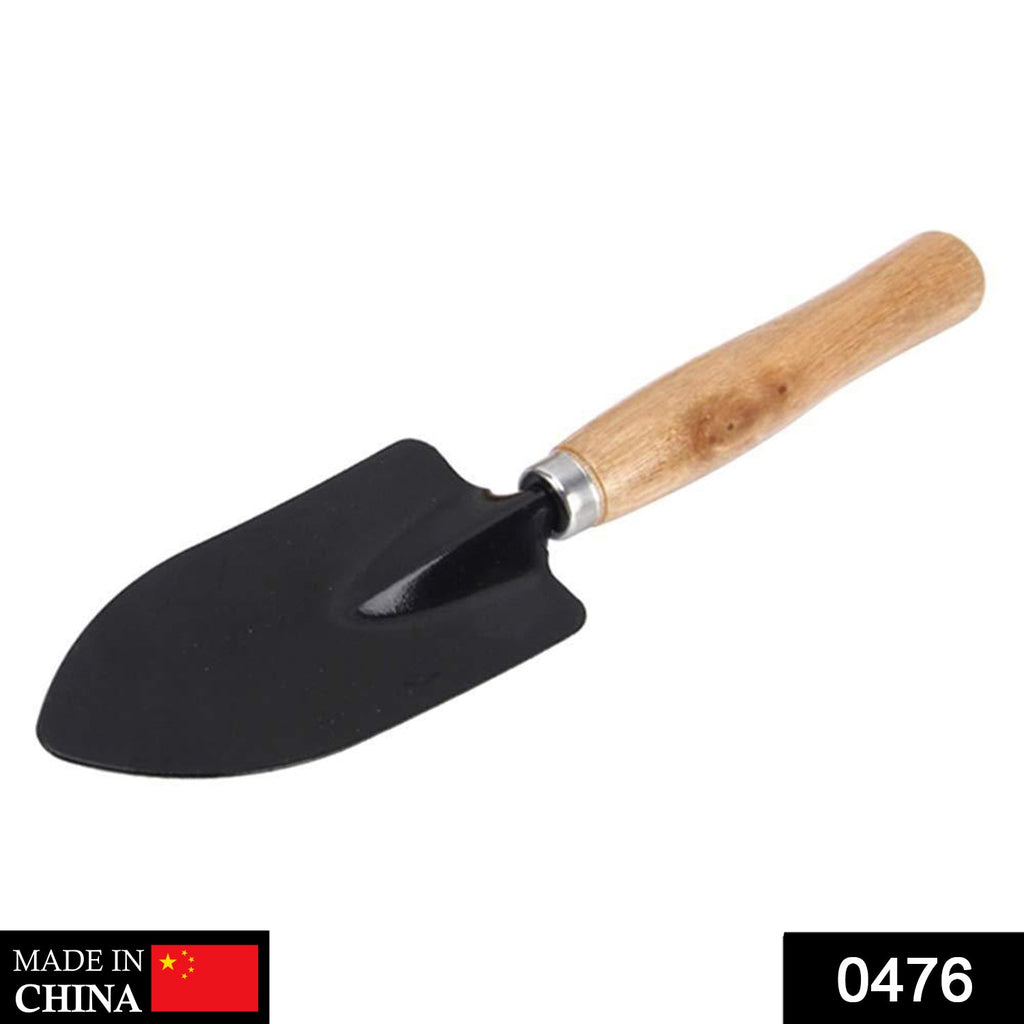 Close-up of the steel blade and comfortable black grip of the hand trowel.