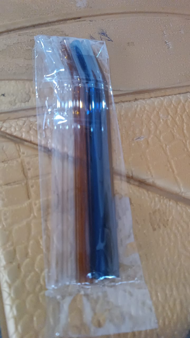 Close-up of transparent borosilicate glass drinking straw