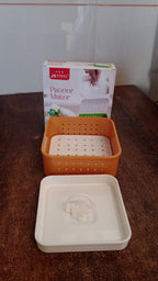 Square Paneer Maker and its packaging, showcasing the product clearly.