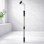 Side view of the electric spin scrubber with its ergonomic design and LCD display.