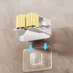 Angled view of the self-adhesive mop holder, emphasizing its sturdy build.