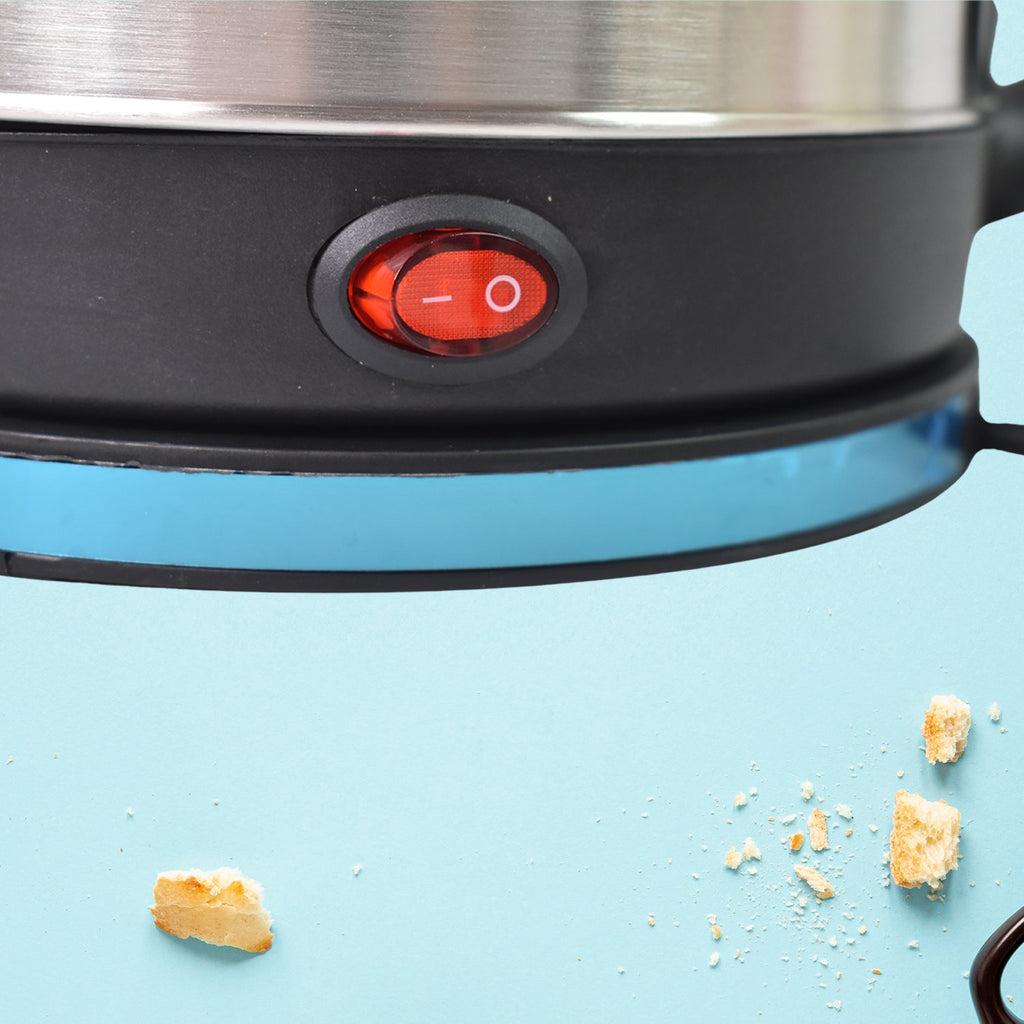 Another angle of the FirePot Electric Multi Cooker, showcasing its sturdy handle and base.