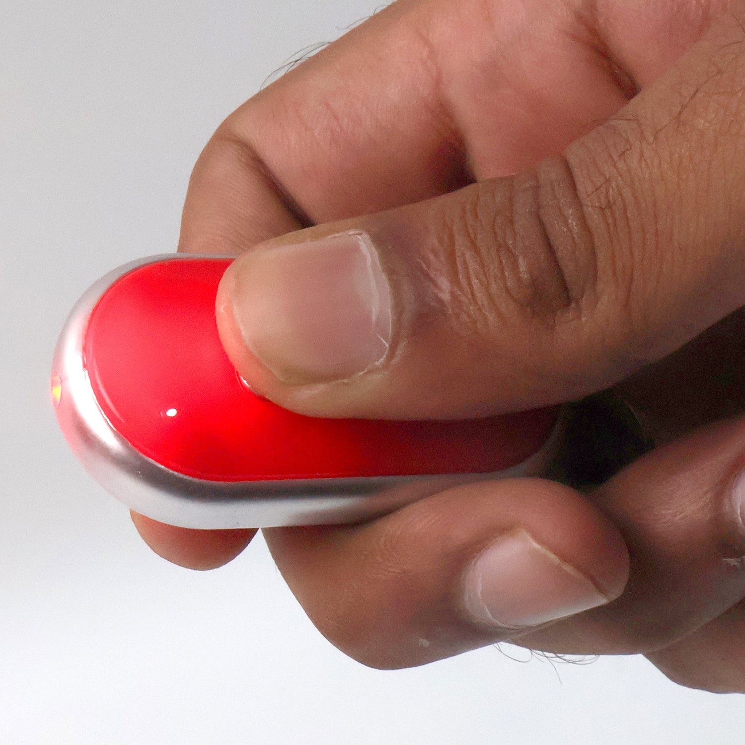 Back view of the key finder device showing its compact design