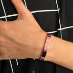 Close up detail of rose gold open cuff bracelet