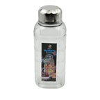 Transparent mukhwas bottle sitting on a kitchen counter with snacks