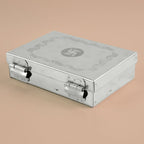 Overhead shot of the empty 6-compartment stainless steel jewelry box.