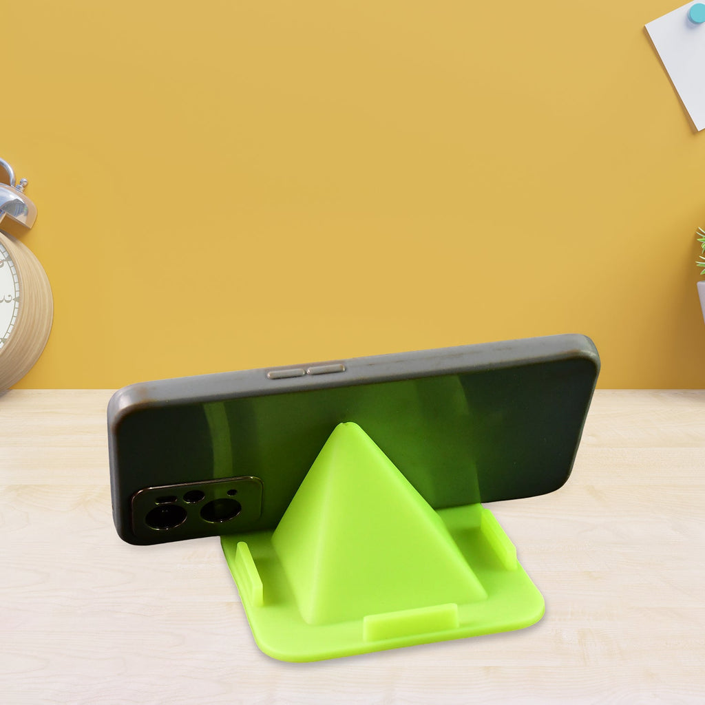 Pyramid mobile holder placed on office desk for hands-free phone use